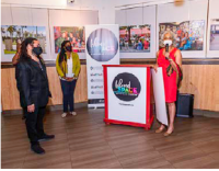 Juliet Roulhac, external affairs director, Florida Power & Light Company (FPL) presents a $20,000 check to the Island SPACE Caribbean Museum Chairman, David Muir and Executive Director, Calibe Thompson. FPL is honored to celebrate the two-year partnership