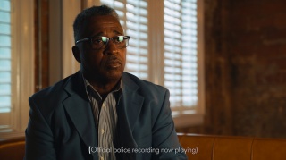 Clinton Jones, Sr., listening to police audio recording the night of Corey's shooting during interview with writer/producer, Jeff Mustard.