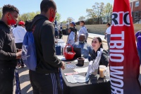 Seated left to right: Mr. Antonio Stephens, Director of SAU’s TRIO Center of Excellence, and Ms. Ashley Smith, Educational Advisor, greet prospective students at SAU’s 2022 Spring Open House. Photo courtesy of Saint Augustine’s University.