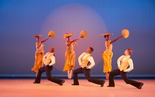 Alvin Ailey American Dance Theater in Alvin Ailey's Revelations. Photo by Dario Calmese
