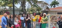 FPL employees attend a ribbon-cutting ceremony to celebrate the unveiling of a new outdoor space at the Pace Center for Girls Broward.