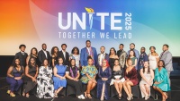 Members of UNCF’s Institute for Capacity Building pose for a group photo on the main stage at UNITE 2025 in Atlanta, Georgia. Photo Credit: Andrew Huth